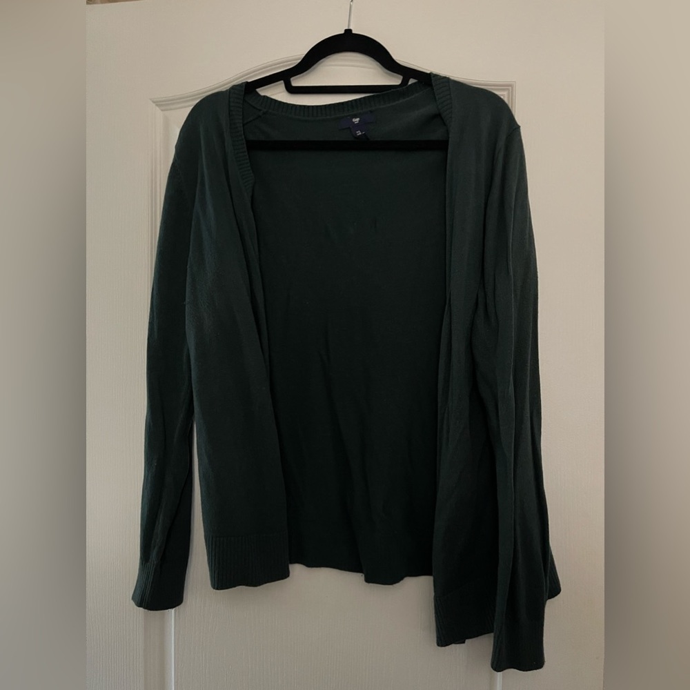 Green cardigan.